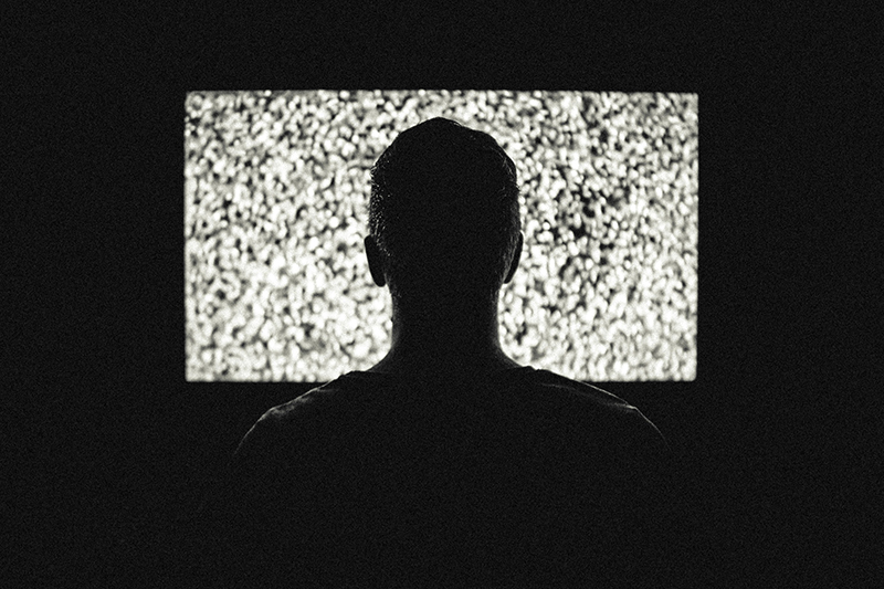 a person watching tv