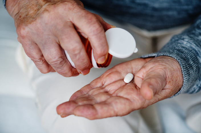 a person taking pill